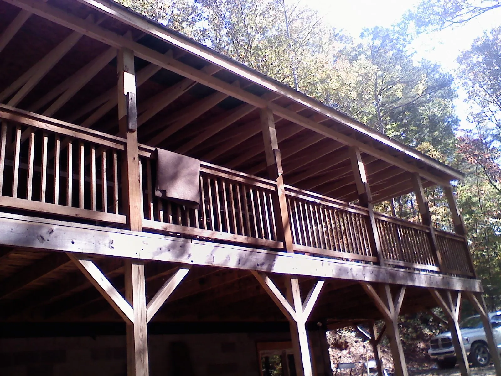 Timber framing under a new elevated porch and deck — Roof Leak Repair in Crater Lake by Roofing Brothers